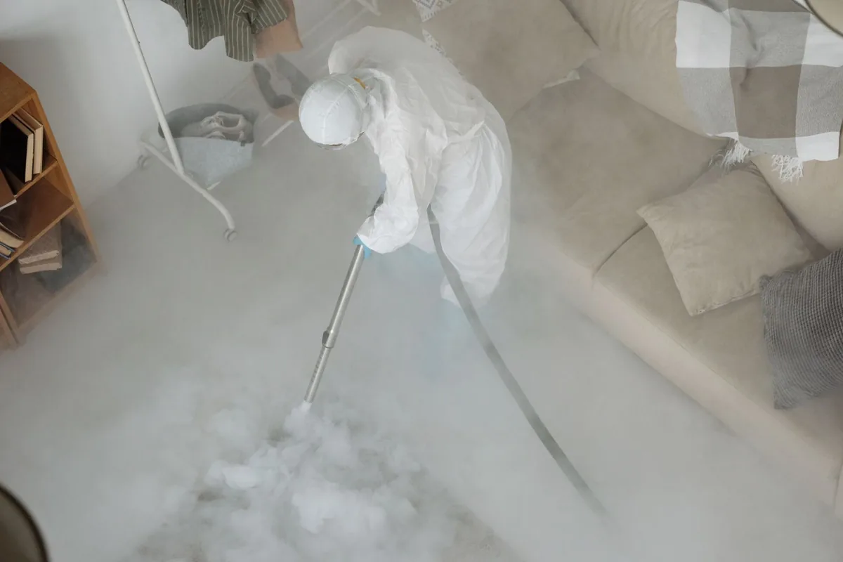 Biohazard cleanup technician in protective equipment, Mona, UT